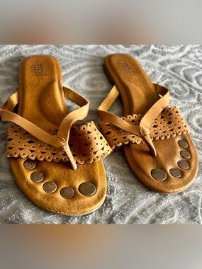 Grounding Women’s Scalloped Tan Thong Sandals with Decorative Studs